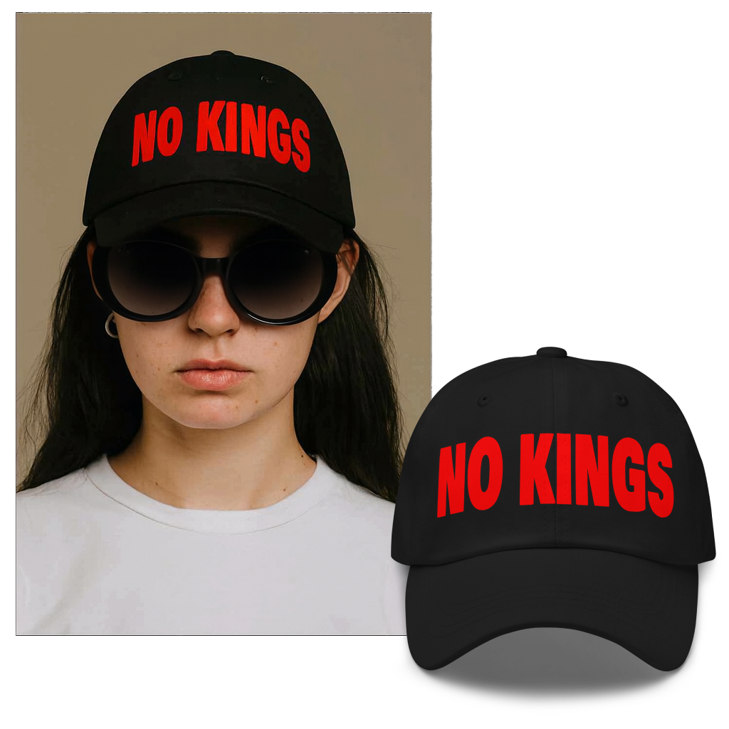 Black cap with 'NO KINGS' text worn by a person, with an additional cap displayed below.